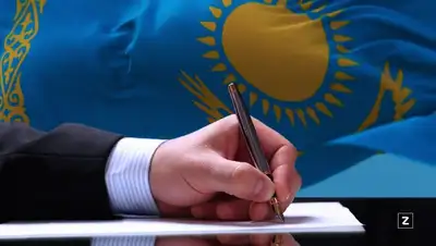 подписание , фото - Новости Zakon.kz от 14.01.2022 15:17