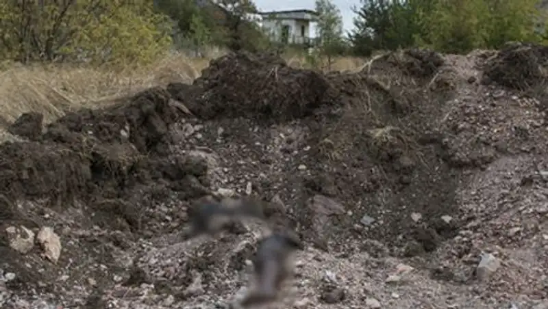 Под Донецком в местах массовых захоронений найдено 400 тел