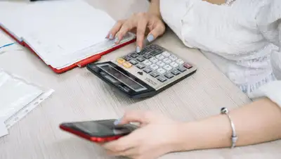 уплата налогов, фото - Новости Zakon.kz от 22.04.2022 14:22