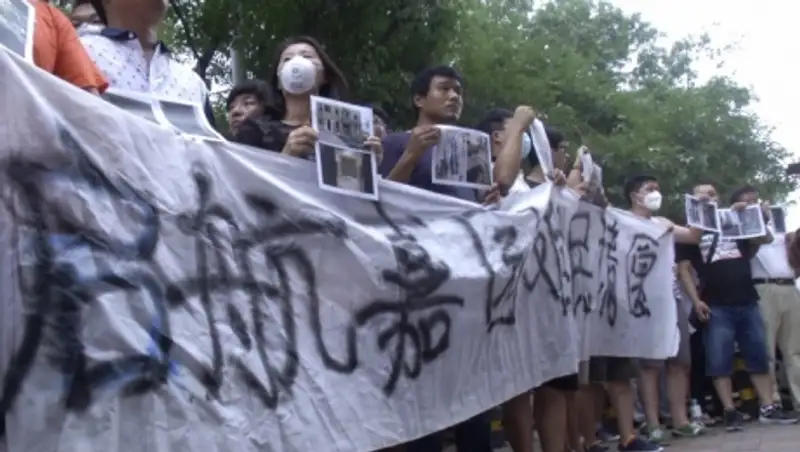 В Тяньцзине почтили память жертв мощного взрыва