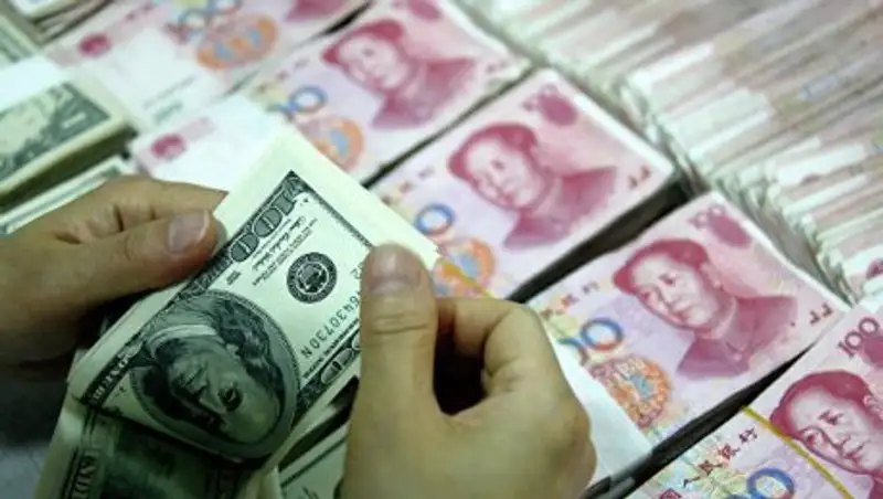 Курс юаня к доллару вновь обновил шестилетний минимум
