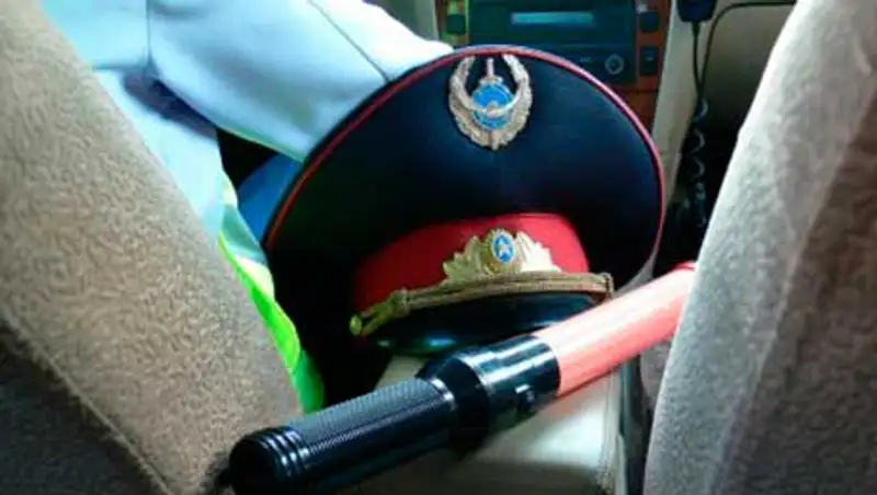 В Алматы осуждены дорожные полицейские за систематическое получение взяток, фото - Новости Zakon.kz от 11.11.2013 20:48