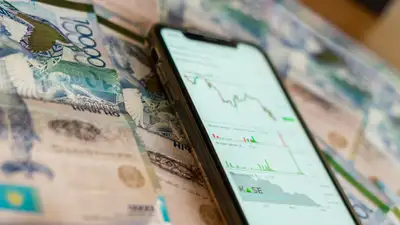 Глава Нацбанка рассказал, когда могут объединить две биржи, фото - Новости Zakon.kz от 12.04.2024 15:30