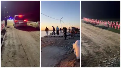 Перевозят на лодках: поврежденную из-за наводнения дорогу восстановили в Атырауской области, фото - Новости Zakon.kz от 21.05.2024 09:52