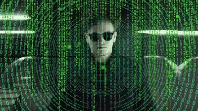 мужчина в очках в окружении цифр, фото - Новости Zakon.kz от 10.06.2025 14:46