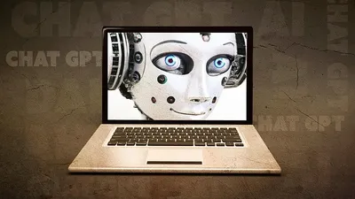 робот на мониторе ноутбука, фото - Новости Zakon.kz от 11.08.2025 15:45