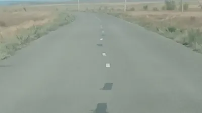 дорога в степи Актюбинской области, фото - Новости Zakon.kz от 11.11.2025 10:49