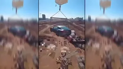 Для чего казахстанец поднял авто на крышу 12-этажки – кадры из Шымкента