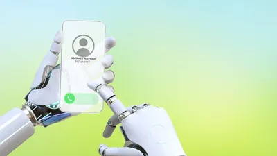 телефон держит робот, фото - Новости Zakon.kz от 24.11.2025 11:30