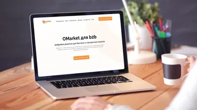 ноутбук, надпись OMarket , фото - Новости Zakon.kz от 17.12.2025 09:00